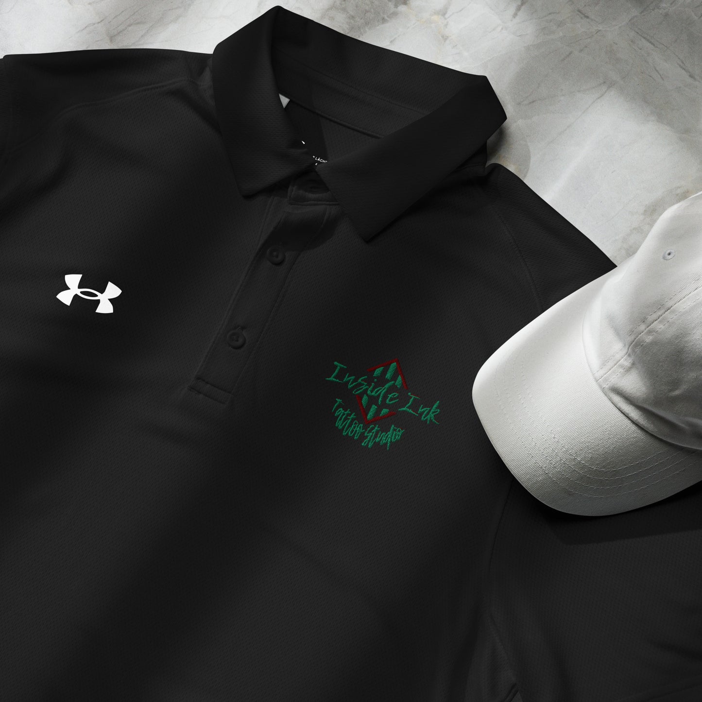 Inside Ink Wild Logo (green and red on black) Under Armour® men's polo